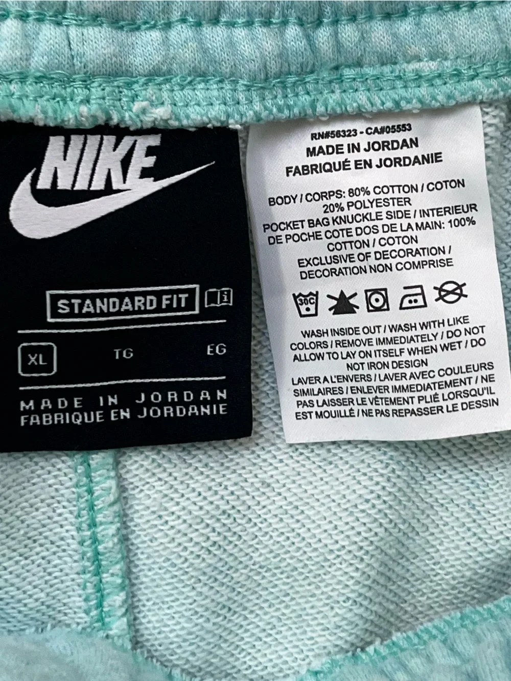 Nike Kids Light Aqua Shorts with Red & Black Logo